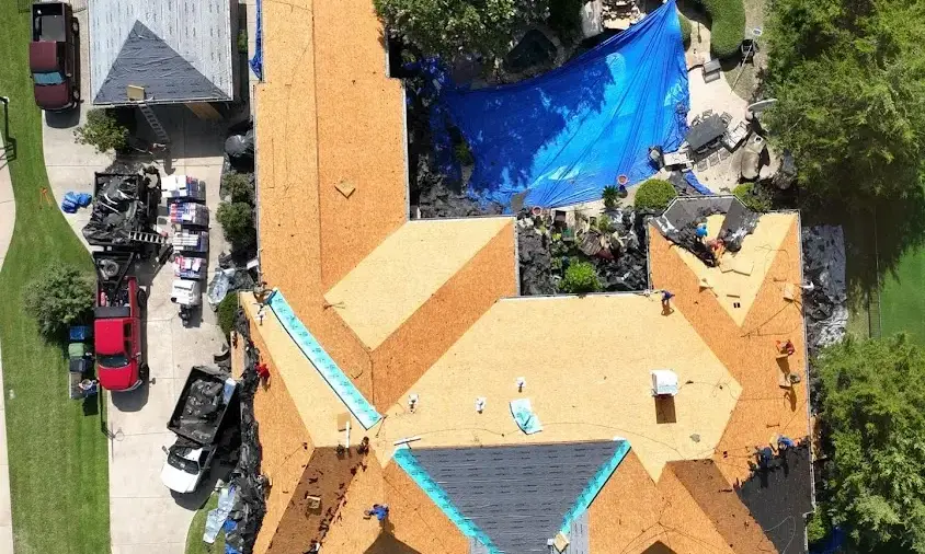 Professional Storm Damage Roof Repair being performed in Dripping Springs